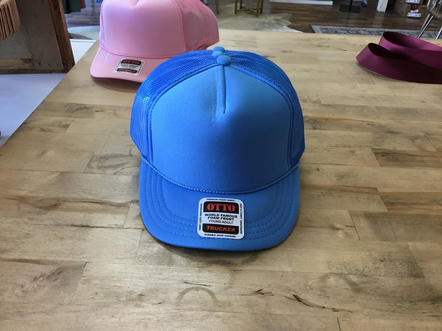 Solid blue youth trucker hat