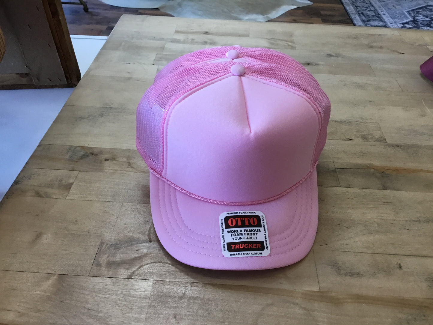 Solid pink youth trucker hat