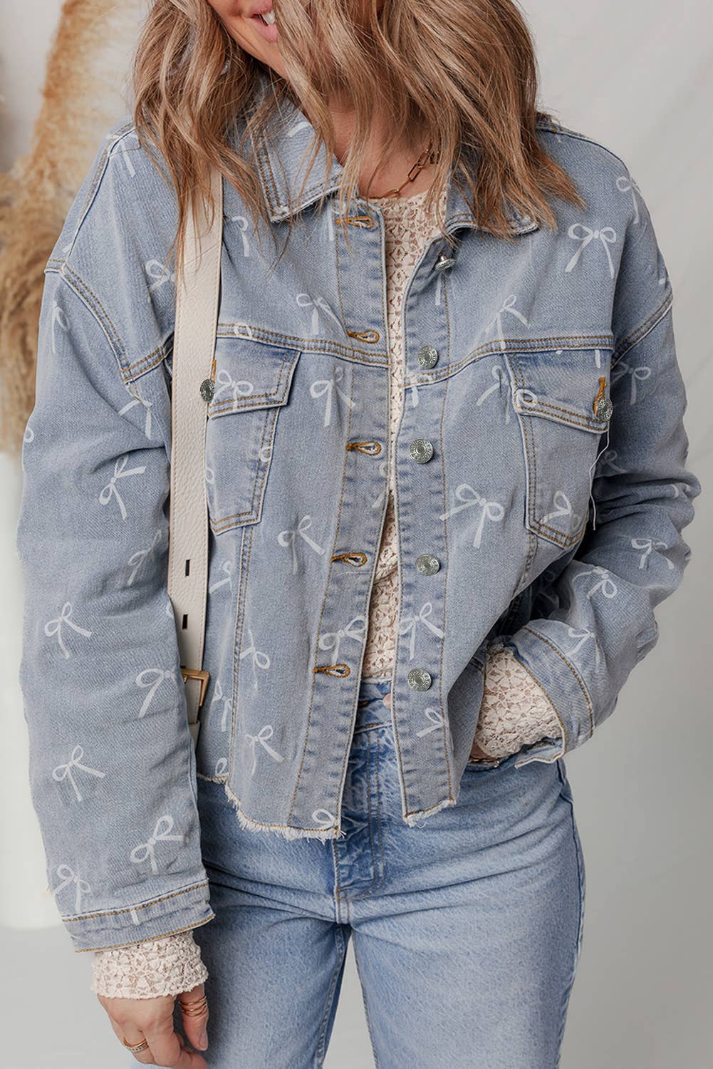 Bow Light Wash Raw Hem Denim Jacket