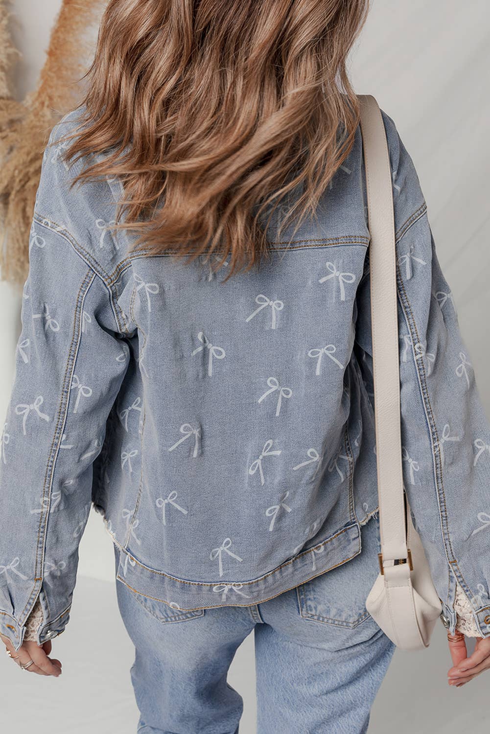 Bow Light Wash Raw Hem Denim Jacket